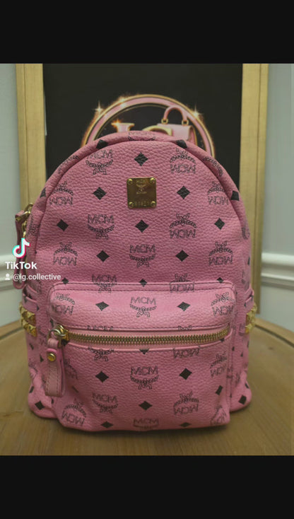 MCM Stark Side Studs Mini Backpack Pink Visetos Leather Backpack Gold Hardware